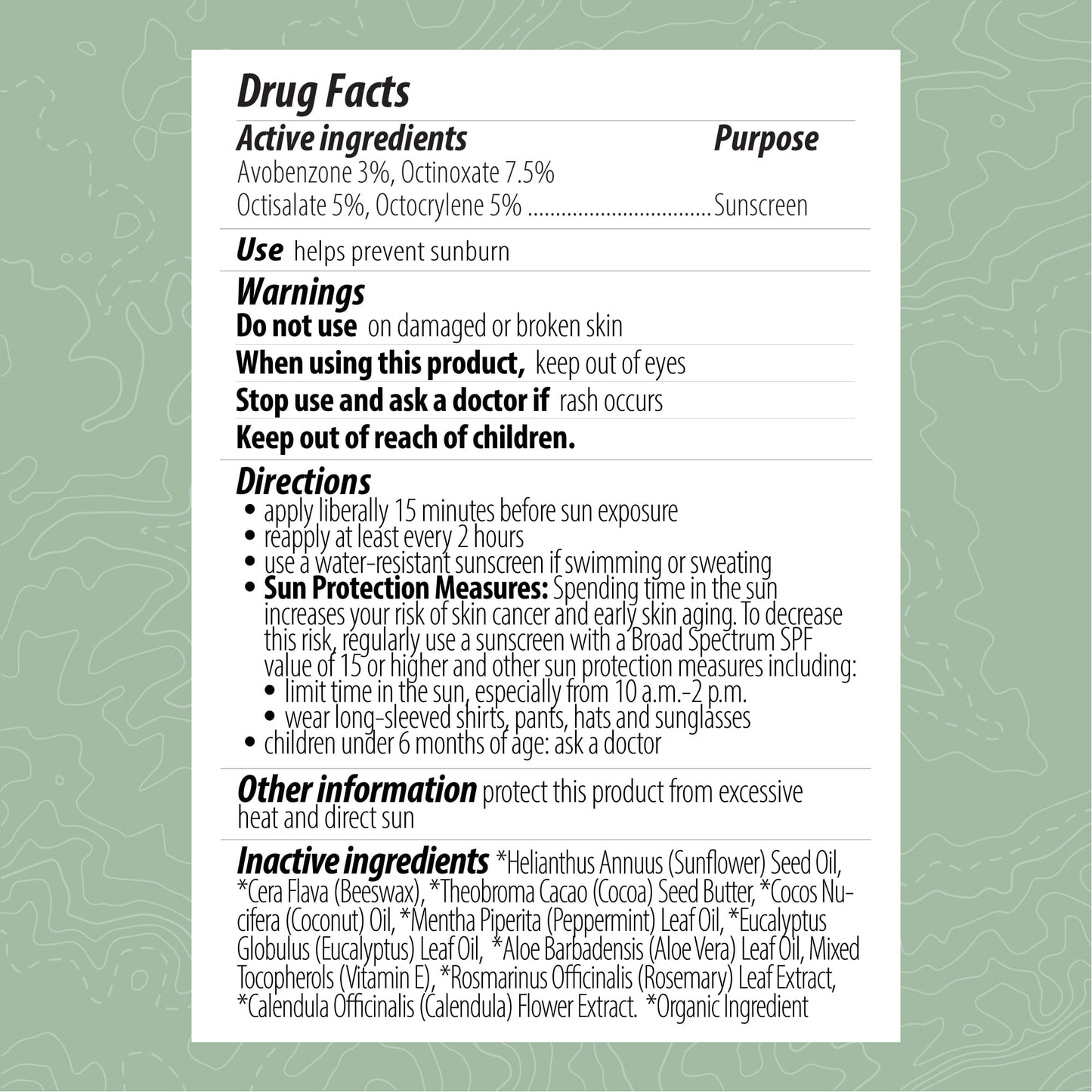 Drug facts label for a sunscreen product on a green background